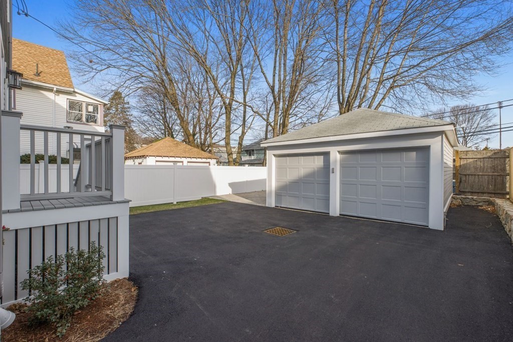 46 Murray Hill Road Boston, MA 02131 - Photo 20 of 25 a front view of a house with a garage