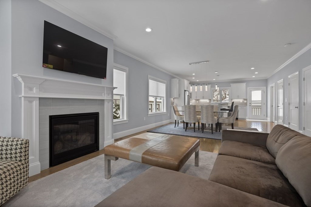 46 Murray Hill Road Boston, MA 02131 - Photo 7 of 25 a living room with furniture and a fireplace