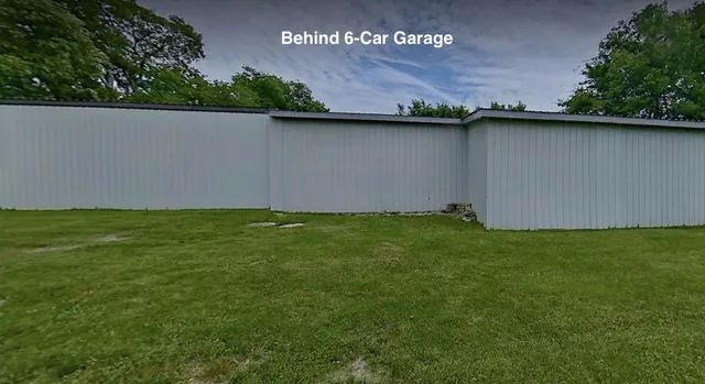 a view of a lake with a yard