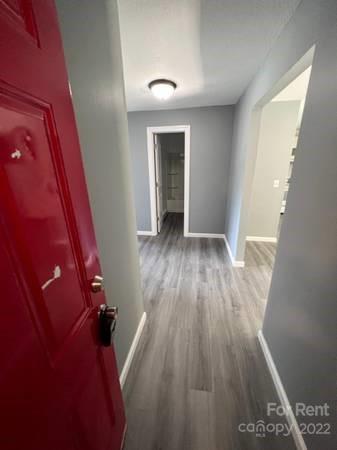 1962 Lakeview Road, Unit A Asheboro, NC 27203 - Photo 6 of 17 wooden floor in a gallery
