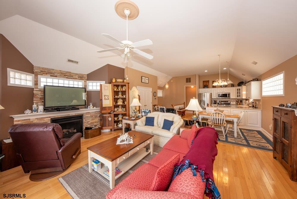 336 West Surf Road Ocean City, NJ 08226 - Photo 23 of 29 a living room with furniture kitchen view and a large window