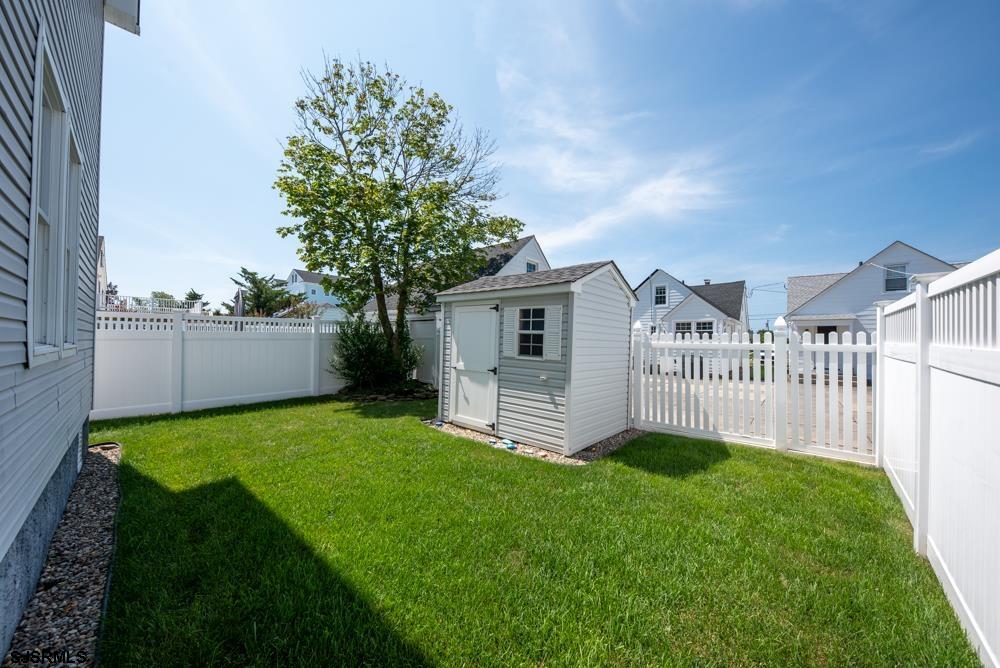 336 West Surf Road Ocean City, NJ 08226 - Photo 29 of 29 a view of a house with backyard and porch