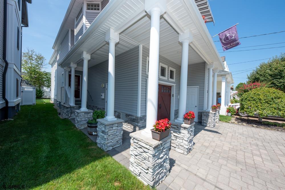 336 West Surf Road Ocean City, NJ 08226 - Photo 4 of 29 a view of a potted plants in front of house