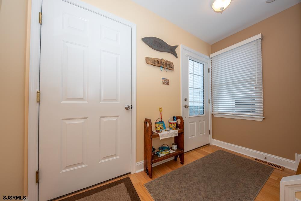 336 West Surf Road Ocean City, NJ 08226 - Photo 6 of 29 a view of a livingroom with toys and a window
