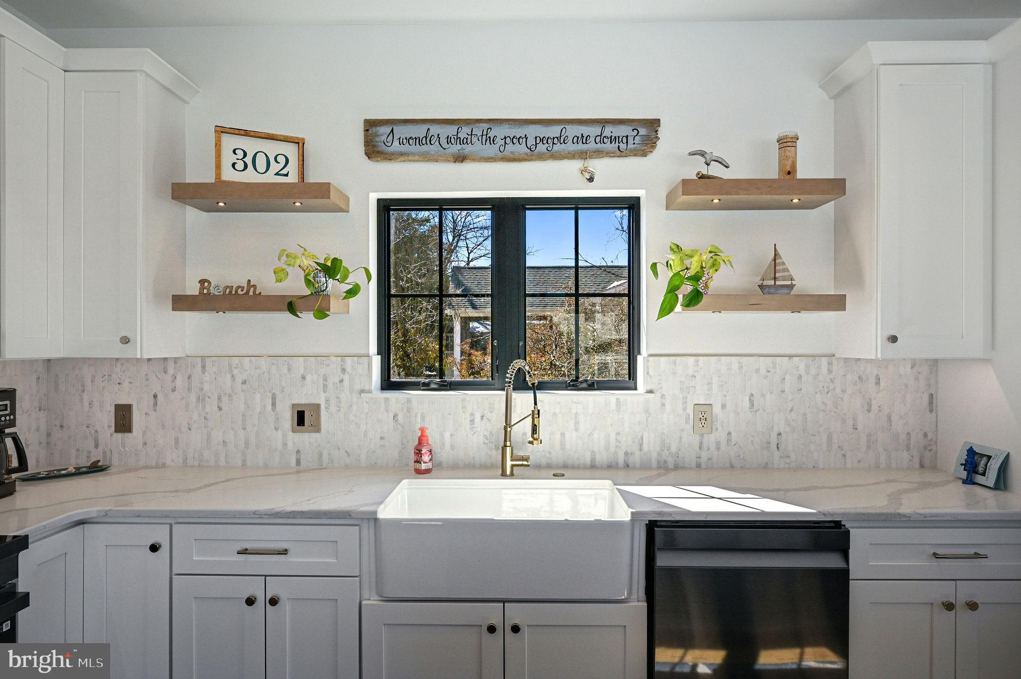103 A New Road Lewes, DE 19958 - Photo 11 of 31 Oversized farmhouse sink with floating shelves