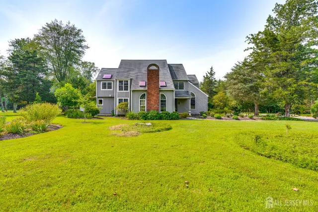 a view of a house with a big yard