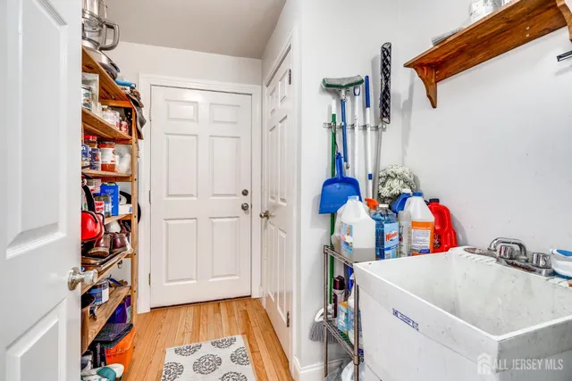 a view of entryway and hall with dining room