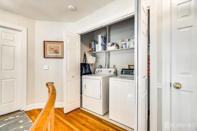 a kitchen with a stove a sink and a refrigerator