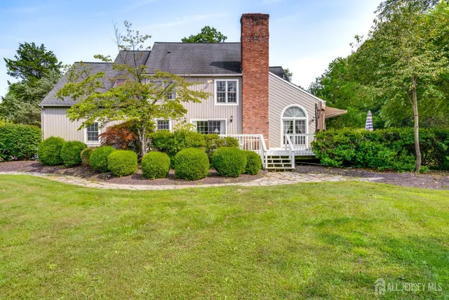 a view of balcony with wooden floor and fence