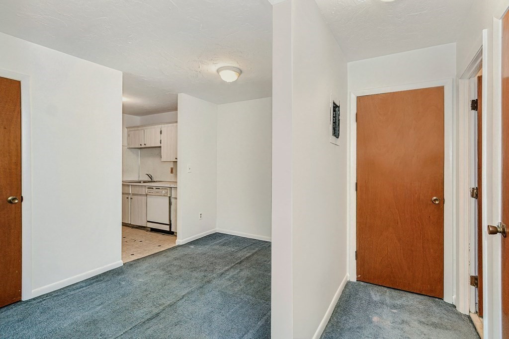 53 Will Drive, Unit 140 Canton, MA 02021 - Photo 12 of 22 a view of walk in closet with white walls