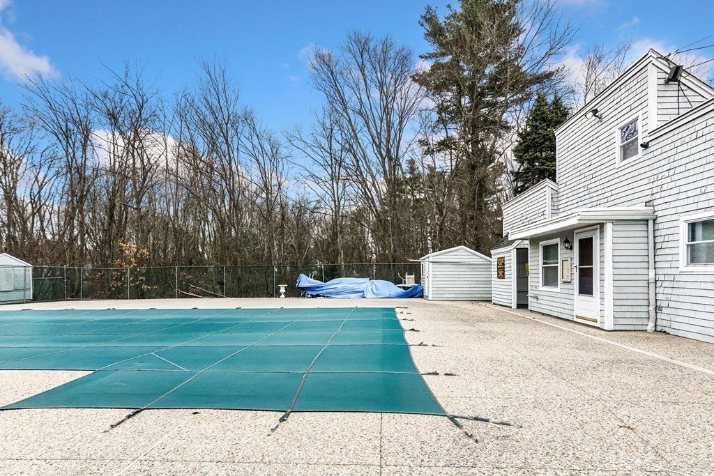 53 Will Drive, Unit 140 Canton, MA 02021 - Photo 17 of 22 a view of a house with a patio