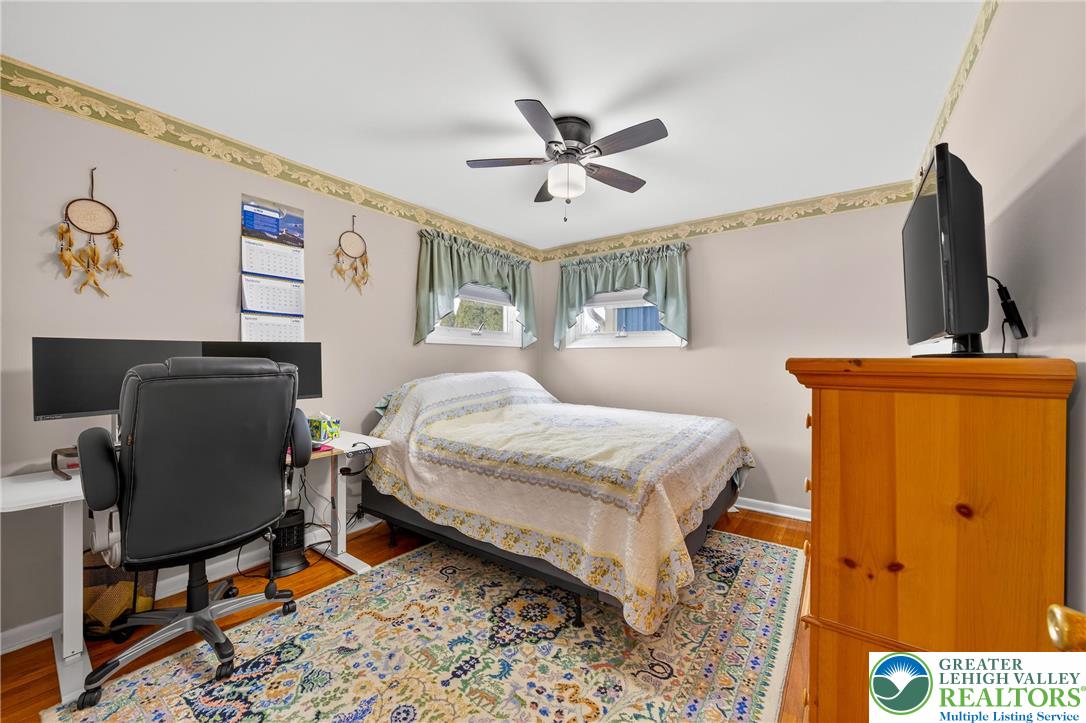 534 Seem Street Emmaus, PA 18049 - Photo 22 of 42 a bedroom with a bed and furniture