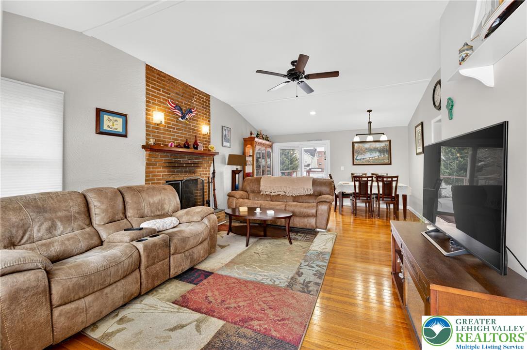534 Seem Street Emmaus, PA 18049 - Photo 4 of 42 a living room with furniture wooden floor and a flat screen tv