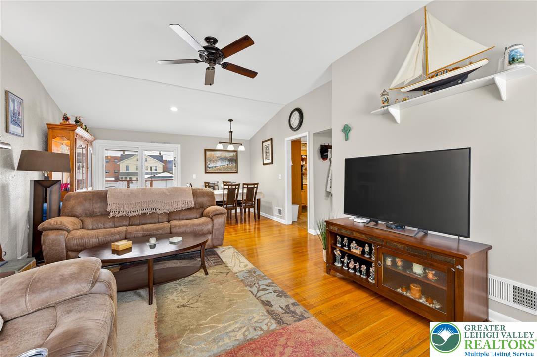 534 Seem Street Emmaus, PA 18049 - Photo 6 of 42 a living room with furniture and a flat screen tv