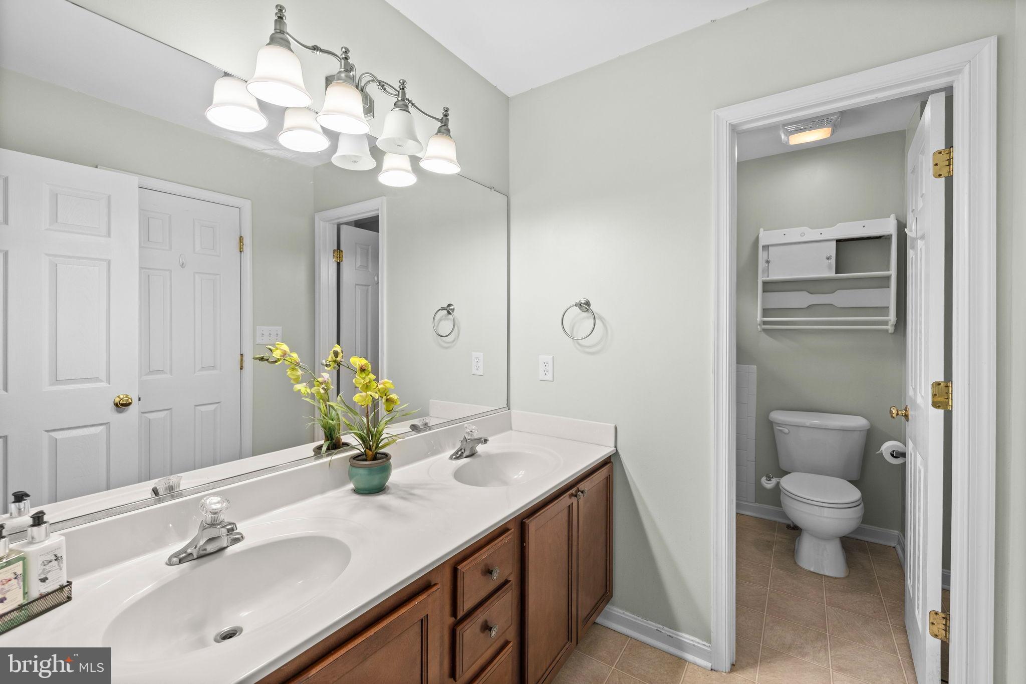 617 Wakefield Drive Colonial Beach, VA 22443 - Photo 37 of 42 Primary bath and walk-in closet