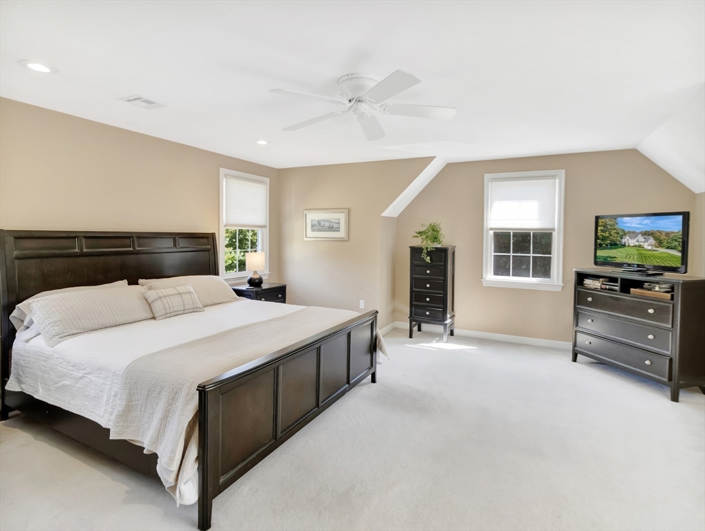 1620 West Street Wrentham, MA 02093 - Photo 15 of 42 a bedroom with a bed and a flat screen tv