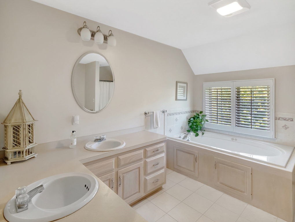 1620 West Street Wrentham, MA 02093 - Photo 21 of 42 a bathroom with a sink and a mirror