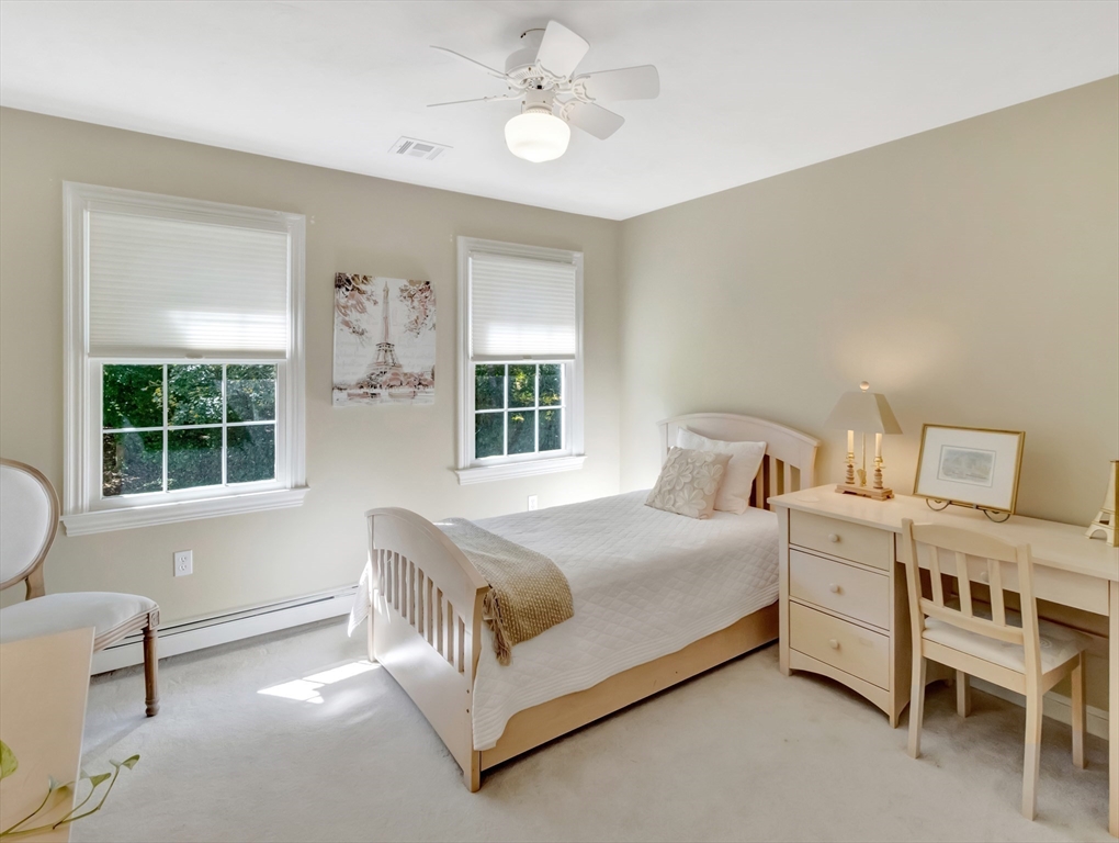 1620 West Street Wrentham, MA 02093 - Photo 23 of 42 a bedroom with a bed chair and a window