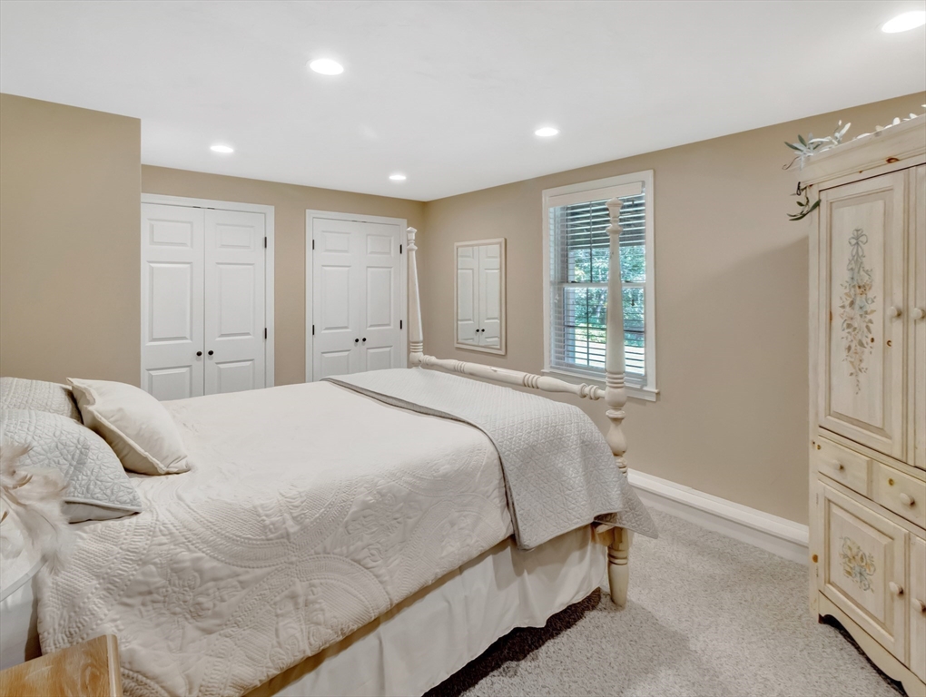 1620 West Street Wrentham, MA 02093 - Photo 32 of 42 a bedroom with a bed and a window