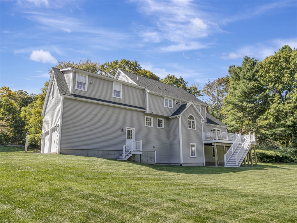 1620 West Street Wrentham, MA 02093 - Photo 39 of 42 a view of a house with a yard