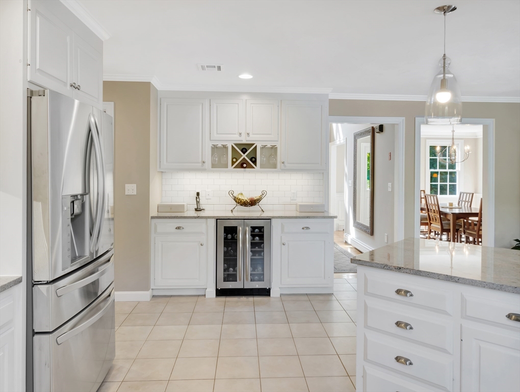 1620 West Street Wrentham, MA 02093 - Photo 4 of 42 a kitchen with stainless steel appliances a refrigerator sink and cabinets