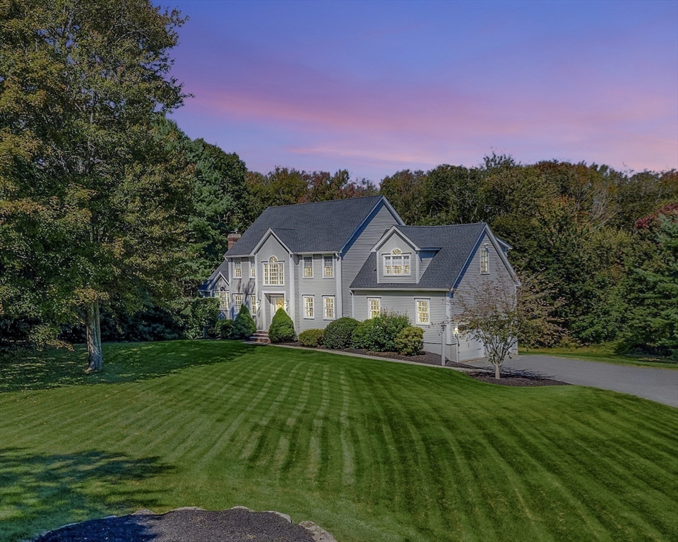 1620 West Street Wrentham, MA 02093 - Photo 41 of 42 a front view of a house with a yard