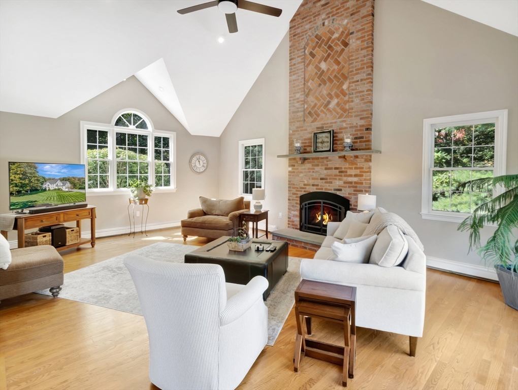 1620 West Street Wrentham, MA 02093 - Photo 8 of 42 a living room with furniture fireplace and window