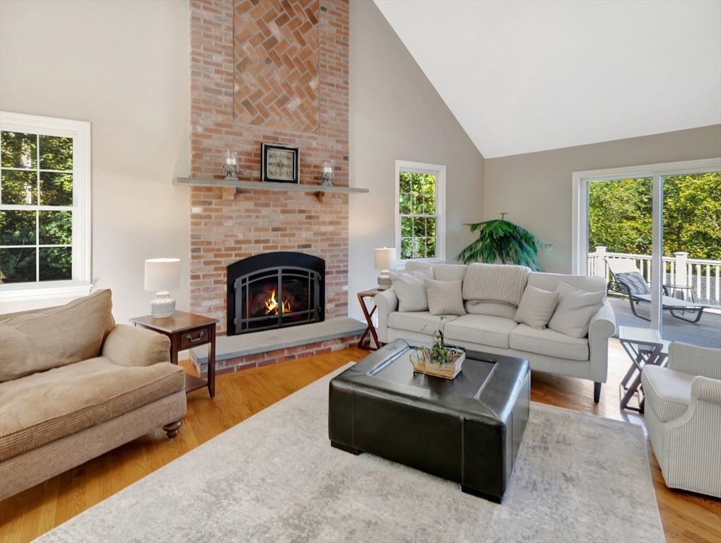 1620 West Street Wrentham, MA 02093 - Photo 10 of 42 a living room with furniture and a fireplace
