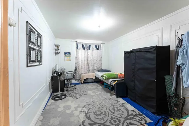 a view of a livingroom with furniture and a window
