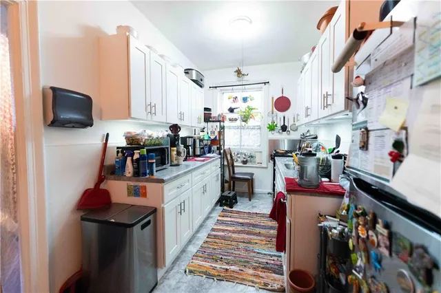 a room filled with furniture and a flat screen tv