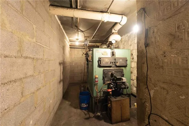 a kitchen with a sink appliances and cabinets