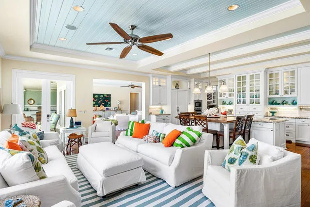 a bedroom with a bed and glass window