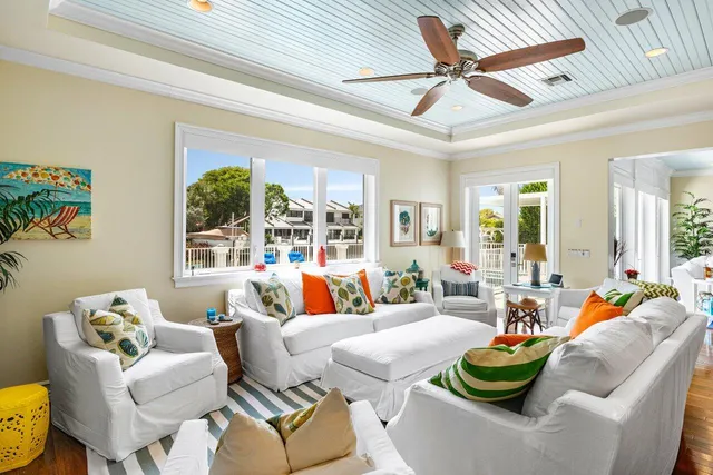 a bed room with furniture and a chandelier
