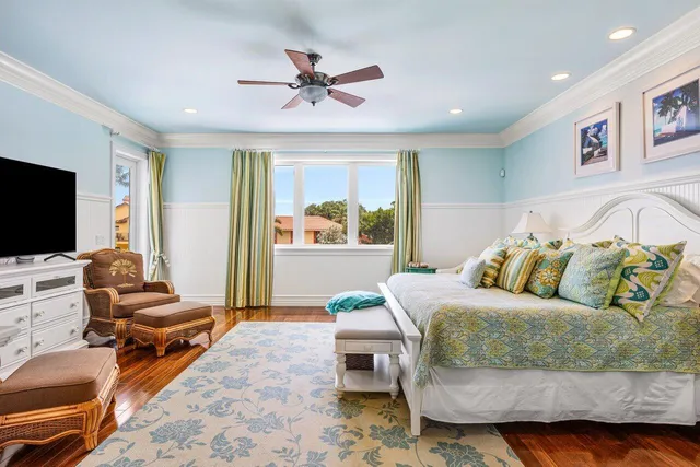 a bathroom with a sink vanity mirror and toilet