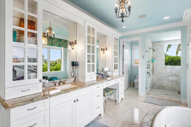 a view of a swimming pool with outdoor seating and yard