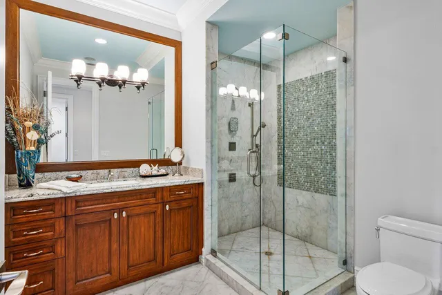 a bedroom with two beds and window