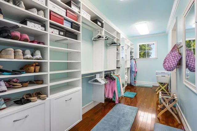 a view of a patio with a dining table and chairs