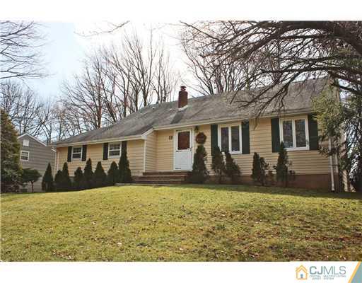 19 Timber Road Edison, NJ 08820 - Photo 11 of 25 front view of a house with a yard