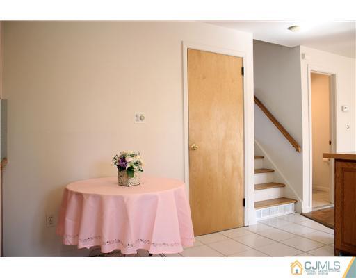 19 Timber Road Edison, NJ 08820 - Photo 19 of 25 a view of entryway with wooden floor