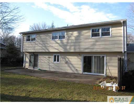 19 Timber Road Edison, NJ 08820 - Photo 10 of 25 a front view of a house with garden
