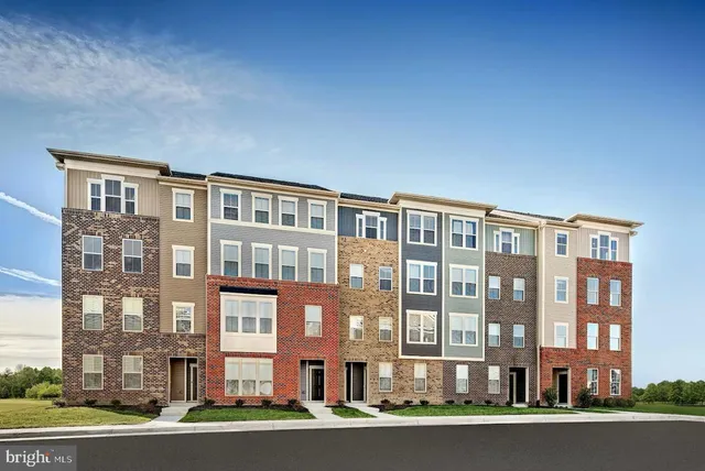 a front view of a building with a street