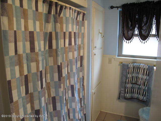 3305 Bedford Road Amarillo, TX 79106 - Photo 17 of 21 a view of a door and a mirror