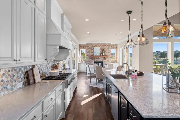 a kitchen with counter space cabinets and appliances