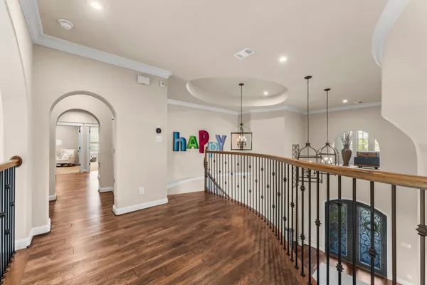 a bedroom with a bed and ceiling fan