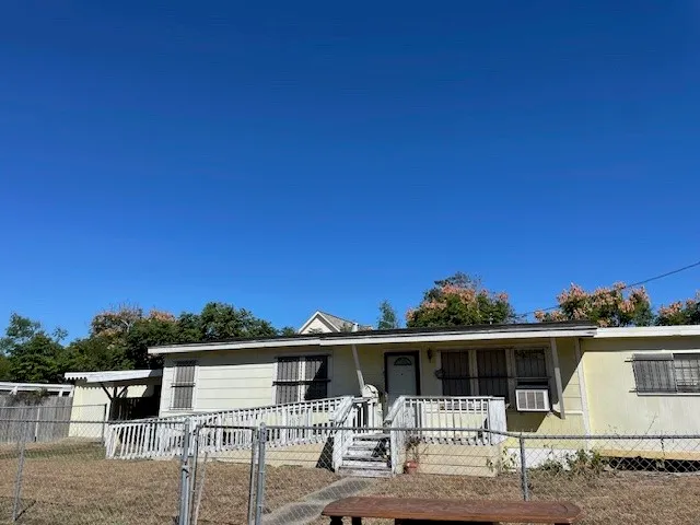 a front view of a house with garage