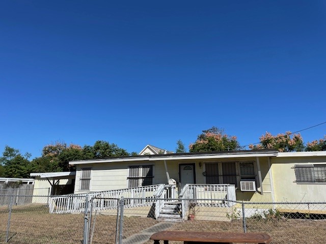 3530 Carrolleton Street Corpus Christi, TX 78411 - Photo 2 of 16 a front view of a house with garage