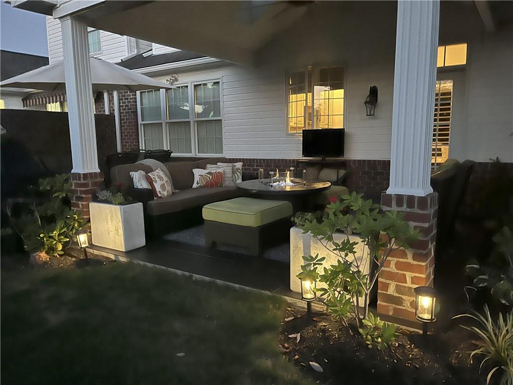 4502 Senate Court Valencia, PA 16059 - Photo 49 of 49 a living room with patio furniture and a flat screen tv