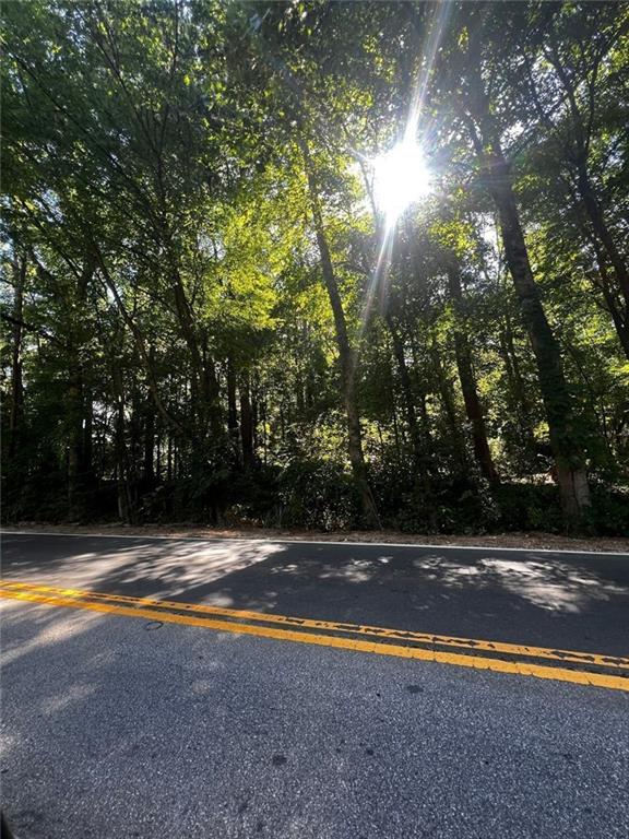 4074 Panola Road Stonecrest, GA 30038 - Photo 6 of 6 a view of swimming pool with an outdoor space and seating area