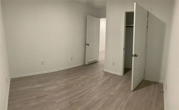 an empty room with closet