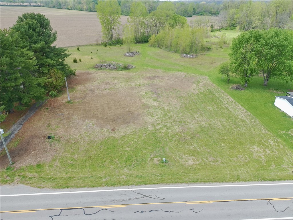 5400 Runkle Road St. Paris, OH 43072 - Photo 1 of 16 Expansive green lot with mature trees, ready for new beginnings.